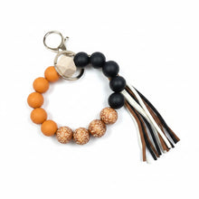 Load image into Gallery viewer, Carved Wooden and Silicone Bracelet Key Chain