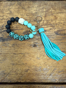 FlowingFaithCo - Handmade Silicone Bracelet Key Chain with Tassle