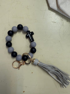 FlowingFaithCo - Handmade Silicone Bracelet Key Chain with Tassle Jesus