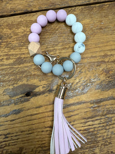 FlowingFaithCo - Handmade Silicone Bracelet Key Chain with Tassle
